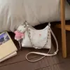 Bolso de Mujer Único con Bloques de Color 2026 Nuevo Bolso Cruzado Dulce con Lazo Bolso de Mano de Cadena de Moda Bolso Mini Dumpling para Chica Popular