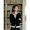 Suéter de punto de estilo intelectual minimalista con bloques de color de hilo Yangzi y lana, imitación de dos piezas, para mujer, top de primavera