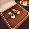 Pendientes geométricos de perlas huecas elegantes y con estilo, clips para orejas de espiral a la moda estilo Chanel, pendientes simples y versátiles