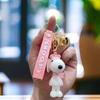Chaveiro de boneca fofa do Snoopy, chaveiro de silicone para carro de casal, pequenos enfeites para mochila, chaveiro criativo