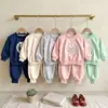 Conjunto de outfit de otoño para niñas de comercio exterior, nuevo conjunto casual de dos piezas para niños estilo coreano, primavera y otoño, con lazo, elegante para bebé