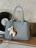 Bolso minimalista, bolso tipo cubo, estilo coreano de moda, nuevo modelo de nicho, bolso de hombro para el trabajo, bolso de mujer de moda 2026, bolso cruzado