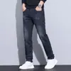 Roupas Masculinas Shanggu Novos Jeans Elásticos Outono e Inverno Versão com Pelúcia Calça Quente Masculina de Cintura Elástica com Cordão Reto