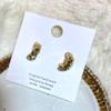 Brincos de strass torcidos com design de nicho Brincos femininos de luxo leve de alta qualidade brincos de moda personalizados nova moda 2023
