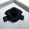 Broche Decorativo de Lazos Estilo Nuevo Venta al por Mayor Simple de Gama Alta Accesorios de Broche de Tela de Camelia Retro Europeo y Americano