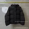 Comercio exterior transfronterizo el mismo estilo de Ouyang Nana chaqueta de plumón cápsula de invierno abrigo de moda para parejas hombres y mujeres