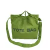 Comércio Exterior Moda Europeia e Americana Estampa de Letras 2026 Nova Bolsa de Ombro de Lona Retrô Bolsa Tote de Grande Capacidade para Trabalho e Deslocamento