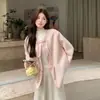 Abrigo corto de lana rosa para mujeres petite, popular este año, nuevo top esponjoso estilo chino otoño/invierno 2026