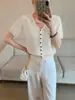 Chamarra de manga corta con botones, elegante y transpirable para primavera y verano, con un diseño único de cuello en V y tela Tencel texturizada