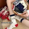Nuevos calcetines para mujer 2026 para otoño e invierno, serie gris con lindo bordado de gato, etiqueta de tela a rayas, calcetines apilados de media pantorrilla gris-azules