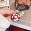 Insígnia de Metal Super Mario Desenho Animado Criativo Cogumelo Personagem de Jogo Broche Periférico Acessórios para Bolsa Insígnia