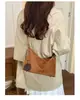 Bolso cubo de gamuza estilo retro para mujer, nueva colección 2026, que irradia un ambiente sofisticado y elegante, perfecto como bolso de hombro, bolso cruzado o bolso de mano, y también un bolso chic para llevar debajo del brazo