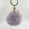 Lindo Nutria Conejo Piel Pompón Pequeño Llavero Colgante Ins Celebridad de Internet Peluche Bola Pequeña de Carbón Colgante para Mochila Bolso Adorno Regalo