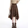 Falda retro de cuadros estilo coreano línea A para mujer, irregular otoño e invierno retazos casual de cintura alta longitud media, nuevo modelo 2026