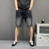 Shorts Jeans Lavados de Alta Resistência Estilo High Street Americano Masculino de Verão com Patches Desgastados Capris Largos Tendência