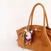 Pingente de Bolsa Porquinho de Feltro de Lã Nepalesa Chaveiro de Carro Tecido à Mão Presente para Casal Pingente de Bolsa Atacado