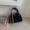 Bolsa de Bolos Minimalista Popular Coreana de Nicho con Textura de Alta Calidad, Bolso Cruzado Versátil Estilo Ballet para Mujer
