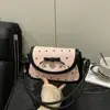 Bolso de Hombro Cruzado Versátil de Moda de Lujo de Nicho de Alto Valor con Estampado de Moño Tendencia Otoño 2026