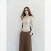 Nuevo suéter beige con cuello en V para mujer 2025, top básico de ajuste ceñido para otoño e invierno