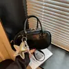 Bolso de hombro modelo nuevo primavera 2026, bolso de axila de nicho de alta gama para el trabajo, bolso cruzado, bolso de diseñador para mujer