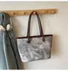 Bolso de Viaje para Mujer 2025 Nuevo Retro Transfronterizo Bolso de Mujer Bolso de Hombro Retro de Mezclilla Bolso Tote Versátil de Alta Gama