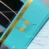 Nuevo collar blanco de nácar con sonrisa, V bañado en oro rosa de 18K, lujo ligero con un toque de alta gama, collar de nácar blanco con caras sonrientes en ambos lados
