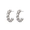 Brincos femininos de venda quente transfronteiriça embutidos em zircão em forma de amor High-end Light Luxury Fashion C- em forma de brincos brincos