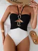 2027 Nuevo Traje de Baño Enterizo para Mujer Estilo Europeo y Americano con Cuello Halter, Diseño Hueco, Corte Ajustado, para Vacaciones en Aguas Termales, Bikini al por Mayor