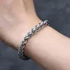 Pulsera Quilla de Acero Inoxidable Hip-Hop Transfronterizo Pulsera de Flor Azul Simple para Hombres Europeos y Americanos Pulsera de Doble Capa de Acero de Titanio Venta al por Mayor