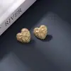 Pendientes de Aro de Amor Coreanos con Aguja de Plata Diseño Nicho Femenino Moda de Gama Alta Pendientes Versátiles