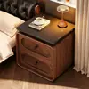 Mesita de Noche Wind Usada 2026 Estilo Nuevo Lujo Ligero Hogar Dormitorio Pequeño Gabinete de Almacenamiento de Madera Estante de Almacenamiento de Mesita de Noche Gabinete