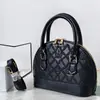 Popular bolsa de concha 2026, nuevo bolso de hombro de moda, bolso de mujer para el trabajo, bolso floral de bordado de hueso para teléfono móvil, bolso cruzado para mujer