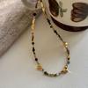 Collar de cuentas de turmalina natural Yuanyou para mujer, cadena de clavícula de dopamina de primavera y verano, estilo retro sencillo de alta gama con bordes cruzados.