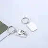 Cartas de poker preto Pêssego um par chaveiro criativo simples aço inoxidável metal anel de chaveiro mochila pingente acessórios