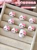 Nuevos adornos de manicura de Hello Kitty rosa con bonito lazo de dibujos animados, adornos de resina para uñas de gato Anxin, venta al por mayor