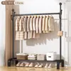 Perchero de piso simple para interiores, perchero para ropa de uso doméstico, tendedero para balcón, perchero de pie, tendedero para apartamentos de alquiler