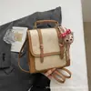 Textura Retro Moda Mujer 2026 Nuevo Casual Simple Mochila para Viajar Diseño de Nicho Versátil Bolso Cruzado Tendencia