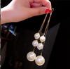 Aretes de botón de aguja de plata 925 aretes de perlas aretes de temperamento retro de alta gama aretes largos de borla aretes de perlas de lujo ligero para mujer