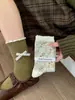 Songmu Outono/Inverno Novo Estilo Designer "Meias de Cano Médio Menina Laço Meias de Algodão Florais Meias Largas Estilo Coreano"