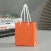 Bolsa de regalo portátil de nuevo diseño, sencilla, de color sólido, para ropa, cosméticos, bolsa de papel portátil con logotipo impreso.