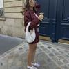 Roupas europeias e americanas 2024 Novas calças com aba e zíper, lapela, jaqueta de manga comprida + minissaia lanterna de cintura alta, terno