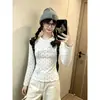 Camiseta de manga larga para mujer con corte ajustado, diseño que ciñe la cintura, hecha de 92% algodón y 8% spandex, con estampado de lunares