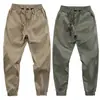Pantalones para hombres trabajadores resistentes al desgaste holgados ropa de trabajo para lavado de autos para sitio de construcción pantalones de trabajo protección laboral ropa de trabajo primavera y otoño