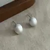 Pendientes de bola cepillada para mujer, diseño de nicho esmerilado de alta gama, pendientes de bola con textura de temperamento de lujo ligero, pendientes retro