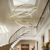 Lámpara de Araña Larga Hueca de Piso Medio Dúplex para Sala de Estar Lámpara de Escalera Anillo Circular Hueco de Acero Inoxidable Lujo Ligero
