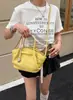 2026 Verano Estilo Coreano Diseño de Nicho Bolso de Mano de Piel de Vaca Bolso Dumpling Bolso Cruzado de Hombro de Cuero Genuino Bolso Cruzado de Moda para Mujer Transfronterizo