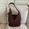 Bolso de Cubo Versátil Vintage para Mujer, Nuevo Modelo Otoño e Invierno 2025, Bolso de Hombro y Cruzado de Gama Alta, Bolso de Nicho para el Trabajo