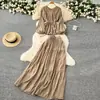 Traje Elegante Rejuvenescedor para Mulheres Primavera Estilo Francês com Alças na Cintura Camisa de Manga Longa com Gola Redonda + Saia Longa Drapeada de Cintura Alta