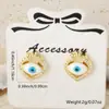 Distrito Lu Joyería de Cobre Caliente Microincrustada Pendientes de Lazo en Forma de Corazón Ojo del Diablo Pendientes Dulces de Moda Venta al por Mayor