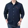 Nueva camisa de manga larga para hombre de comercio exterior, estilo primavera y otoño, camisa de trabajo holgada y moderna, top casual para hombre con múltiples bolsillos